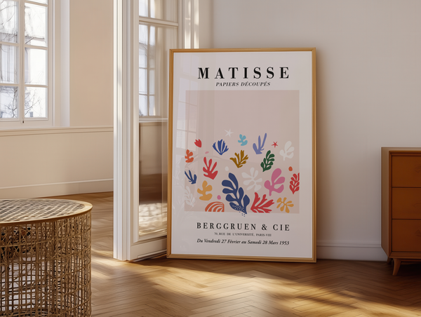 Matisse plakat med farverige, organiske bladformer i pastelfarver på lys baggrund – inspireret af Matisse’ papirklipkunst.
